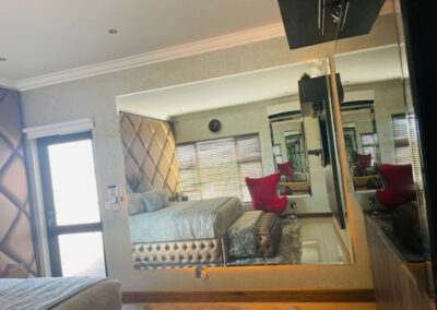 A large mirror inside bedroom